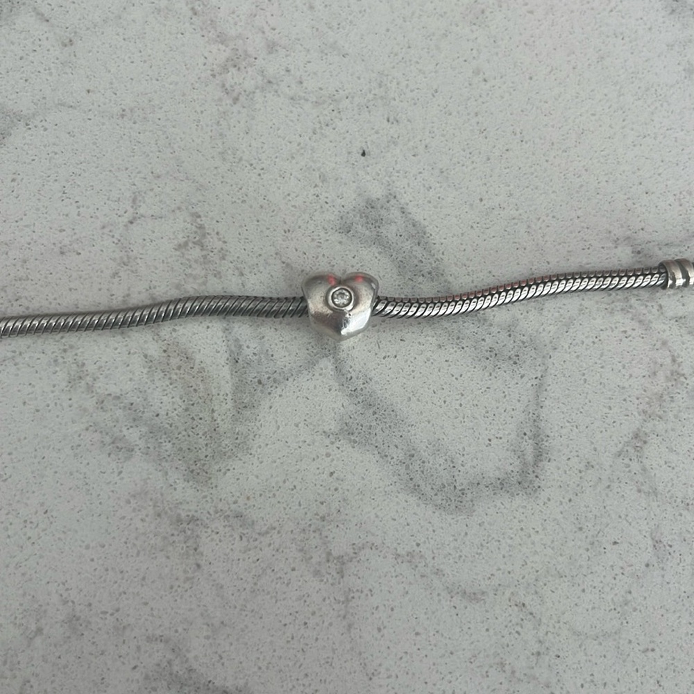 Retired Pandora: 790134CZ Sterling Silver Heart w/ Clear
Zirconia Charm
